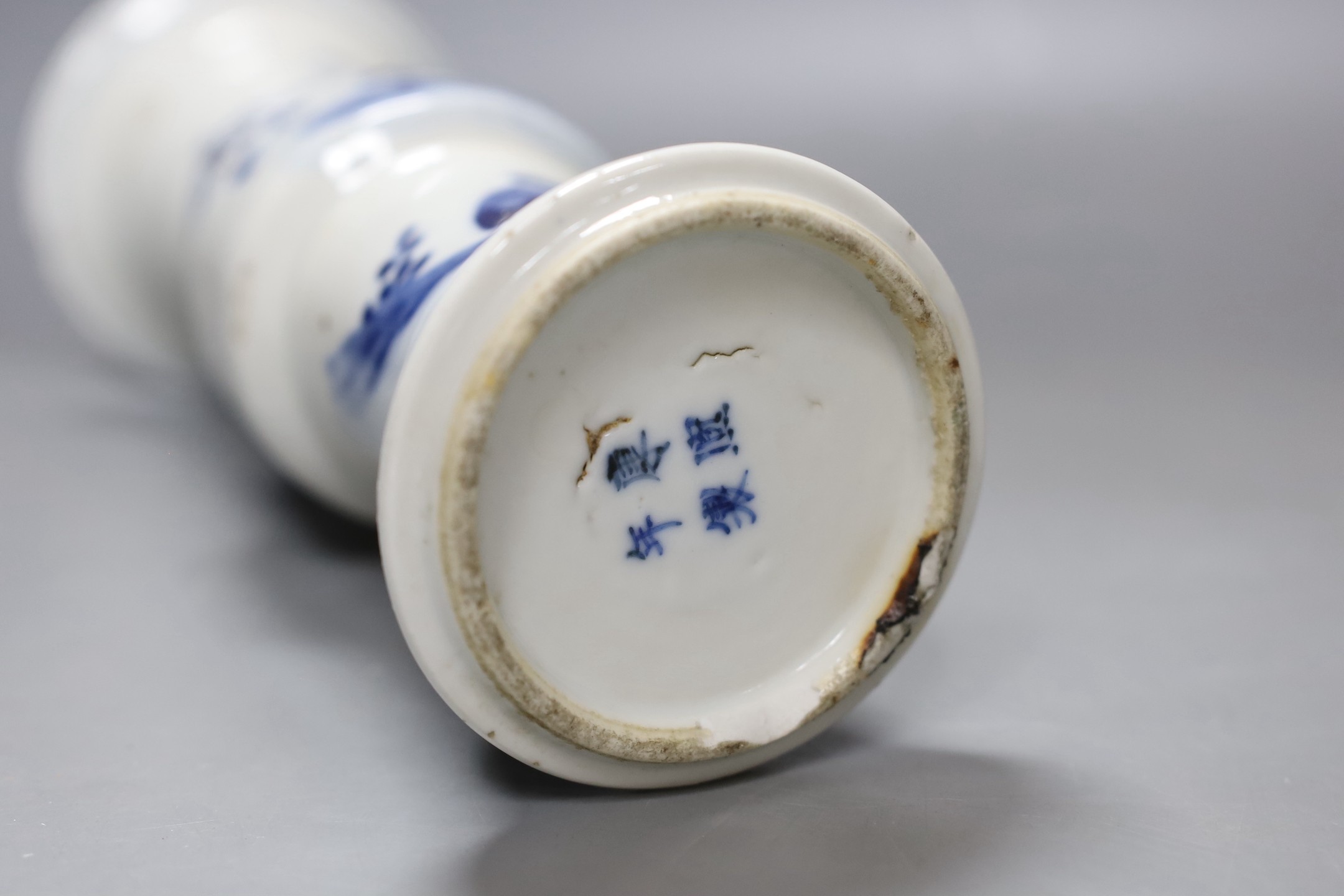 A 19th century Chinese blue and white beaker vase - 27cm tall